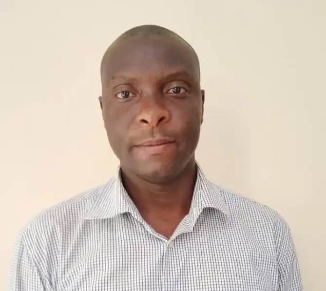 Portrait of Sunday Dallan, Business Development Officer at HESED EduSuite